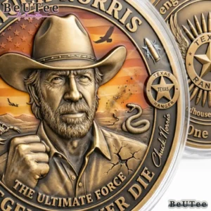 Close view of a bronze memorial coin portrait with a cowboy hat and desert background.