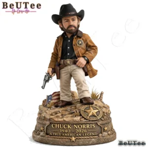 Front isolated view of a western style memorial collectible figure with a rocky base.