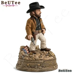 Side isolated view of a western style memorial collectible figure with a rocky base.