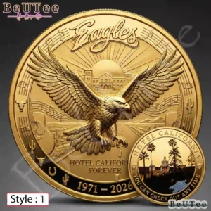Gold anniversary coin with a large eagle over a desert road and hotel scene.