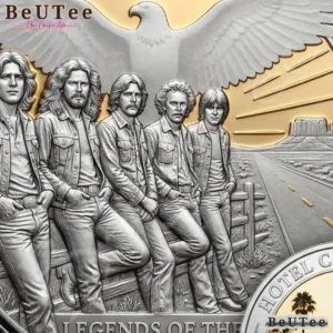 Close view of a silver coin with a band portrait and eagle background.