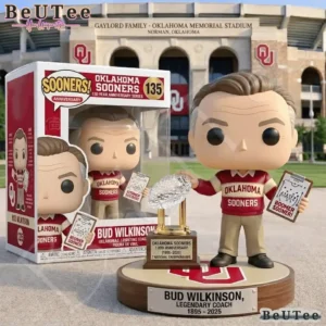 Oklahoma Sooners anniversary coach doll with box and trophy.